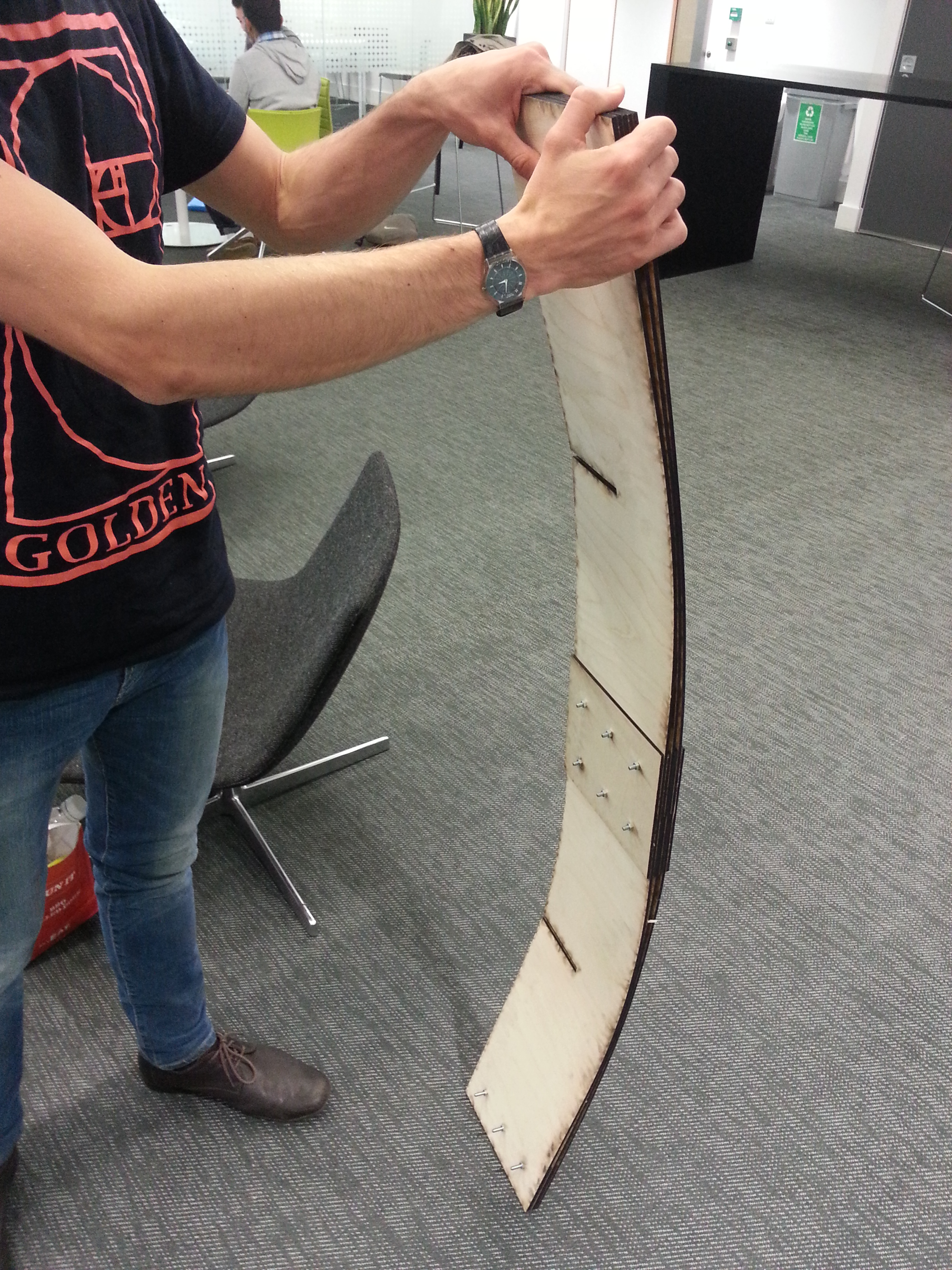 Chris Ingram testing the bendiness of the laminate structure